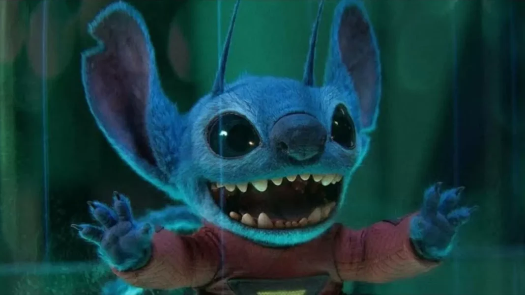 Personaje azul animado con dientes grandes y orejas.